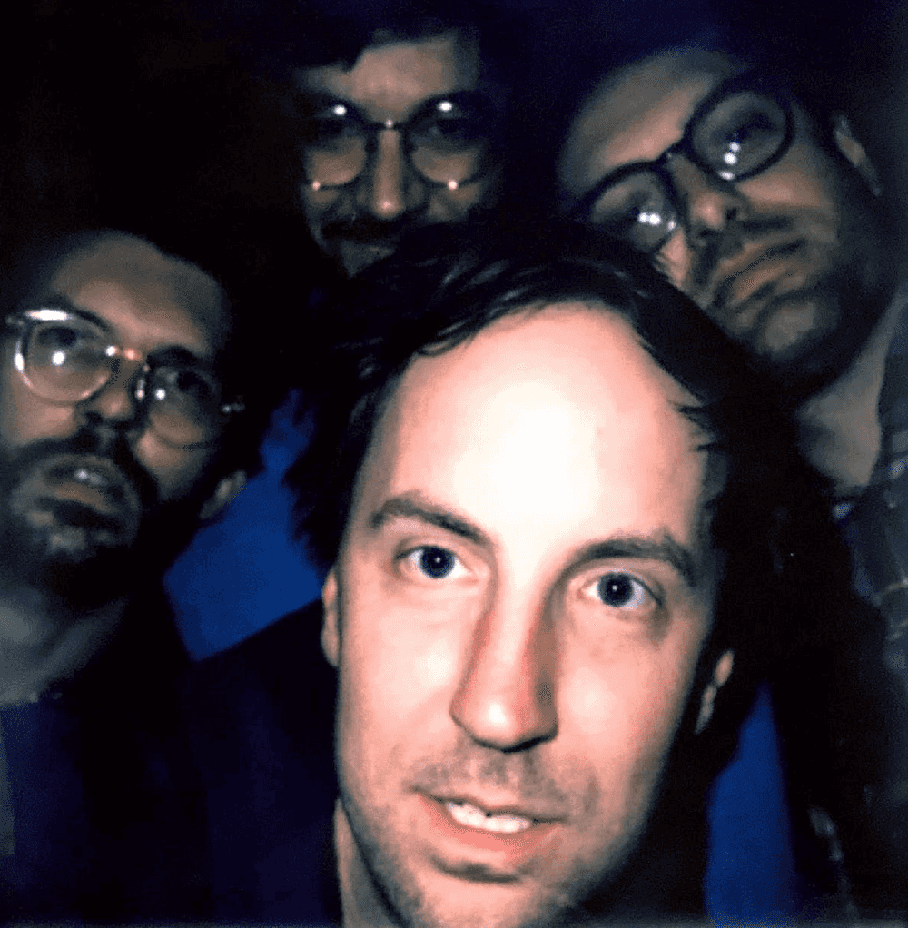The four members of Worn Through, Matt, Nick, Greg and Matt huddled close together for a selfie.